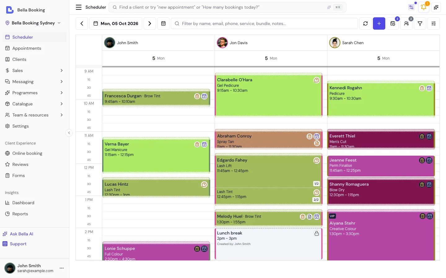Bella scheduler day view — appointments, deposits, and rebookings shown on the production interface